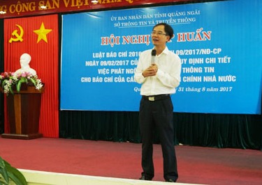 Ông Nguyễn Văn Hiếu trình bày tại hội nghị