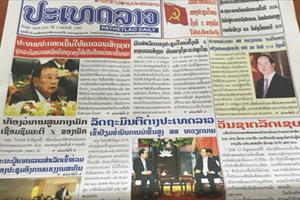 Báo Lào đưa tin đậm nét chuyến thăm của Chủ tịch nước Trần Đại Quang